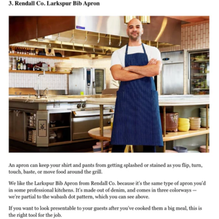 Person wearing a blue apron in a kitchen setting with Rolling Stone branding.